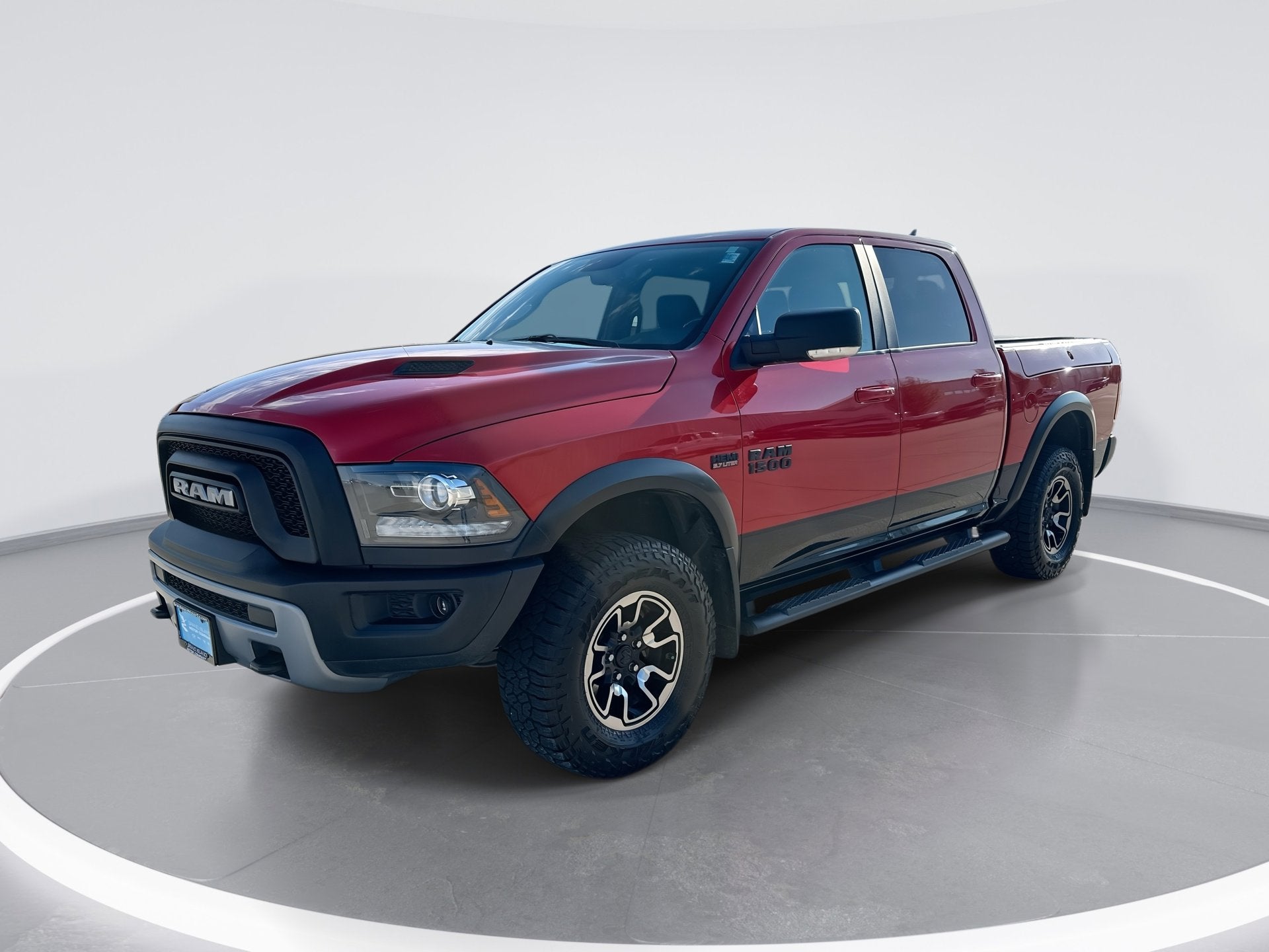 2017 RAM 1500 Rebel in Flame Red Clear — front three-quarter view