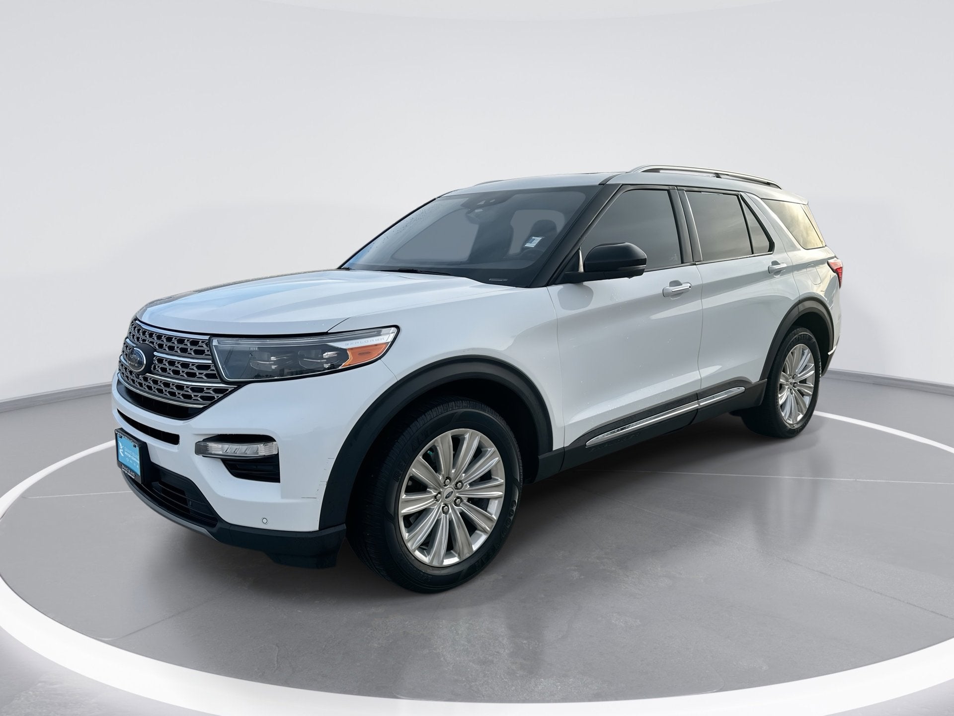 2020 Ford Explorer Limited in Oxford White — front three-quarter view