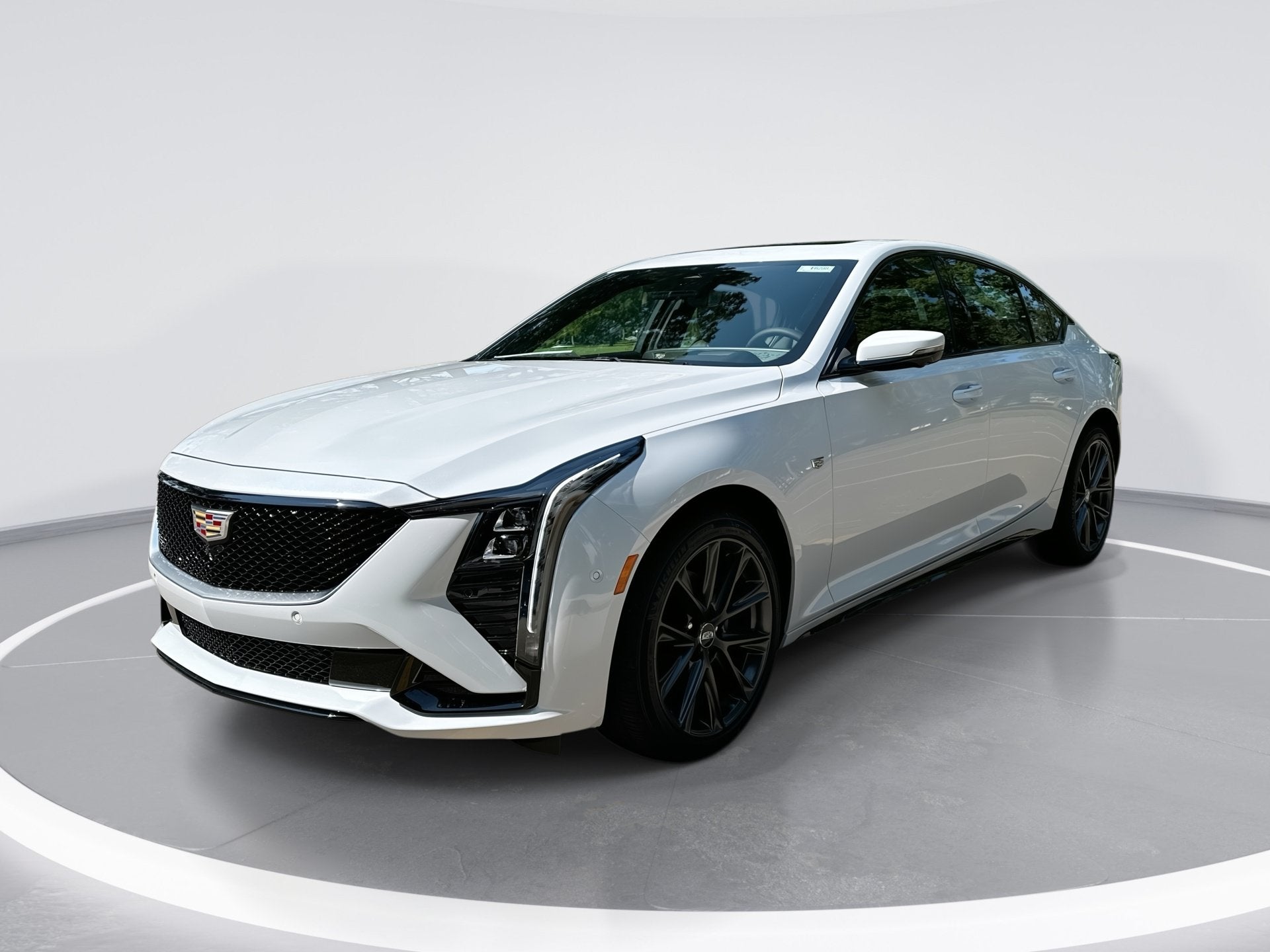 2026 Cadillac CT5 Sport in Vibrant White Tricoat — front three-quarter view