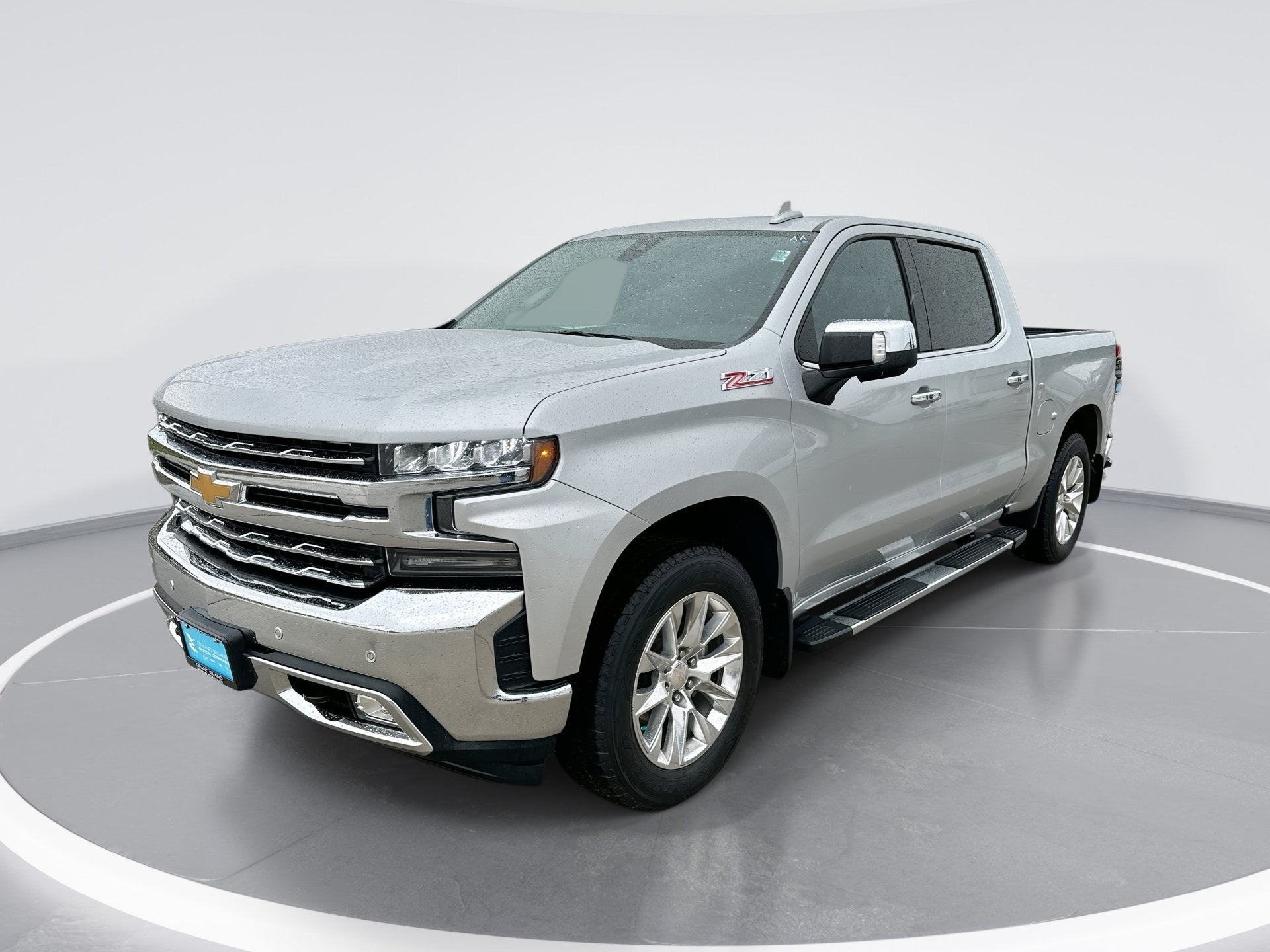 2021 Chevrolet Silverado 1500 LTZ in Silver Ice Metallic — front three-quarter view
