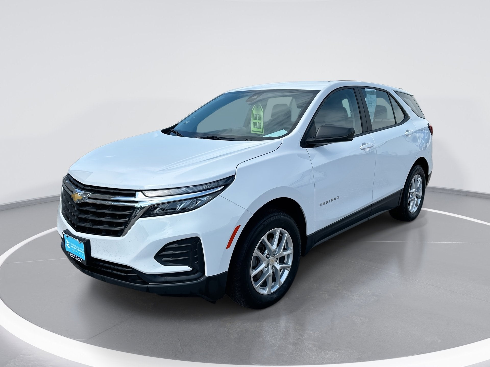 2024 Chevrolet Equinox LS in Summit White — front three-quarter view